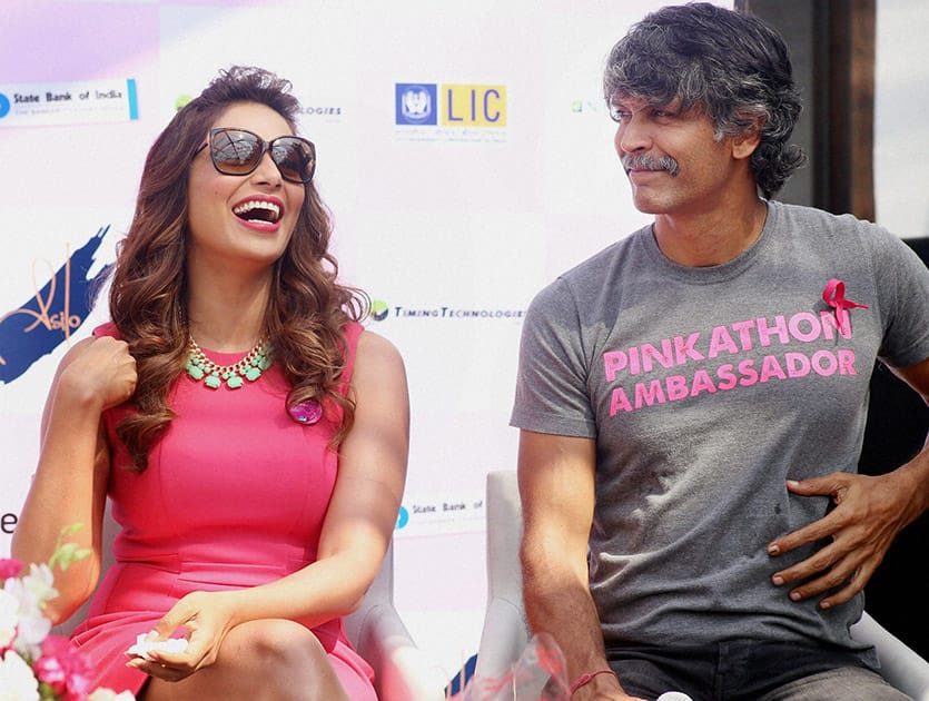 Bollywood actors Bipasha Basu and Milind Soman during the announcement for the Pinkathon in Mumbai.