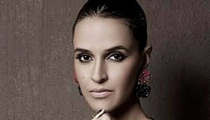 I want Karan Johar to direct me: Neha Dhupia