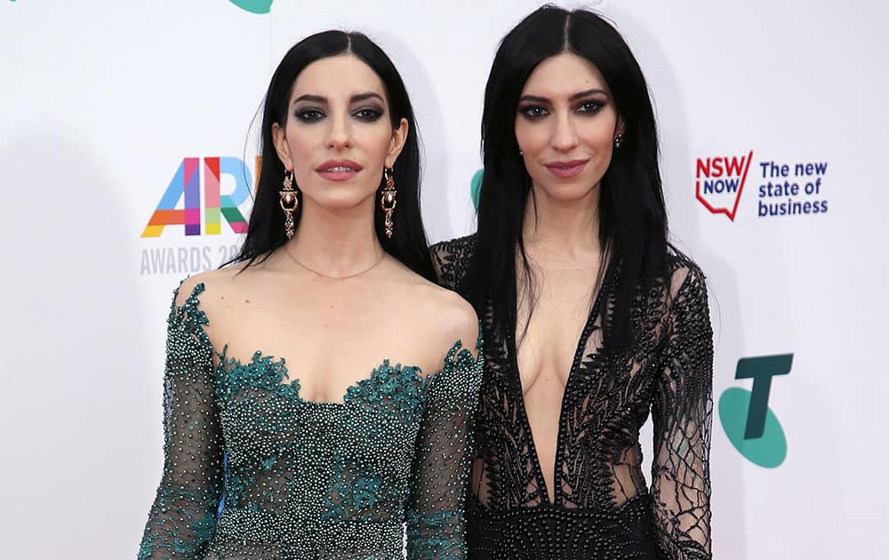 Australia's The Veronicas with sisters Lisa, left, and Jessica Origliasso arrive for the Australian Recording Industry Association (ARIA) awards in Sydney.