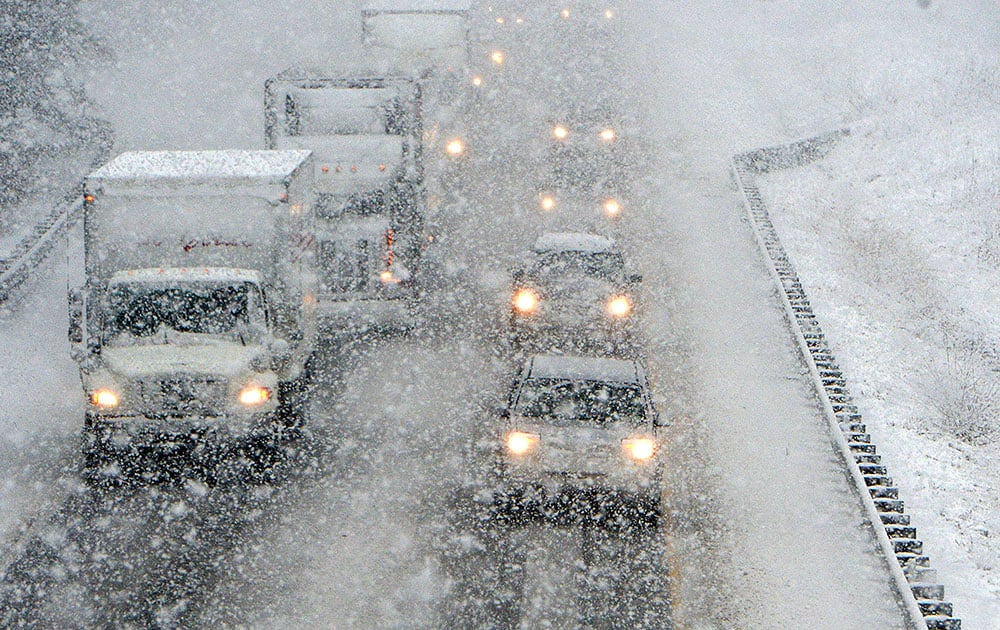 Motorists brave the falling snow as they head south on Interstate 81 near Staunton, Va.
