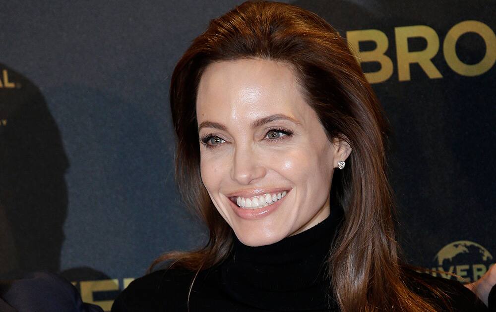 Angelina Jolie poses for photographers during a photo call for the movie 'Unbroken' in Berlin, Germany.