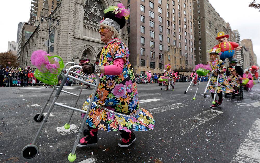 Women march during the Macy's Thanksgiving Day Parade, in New York.