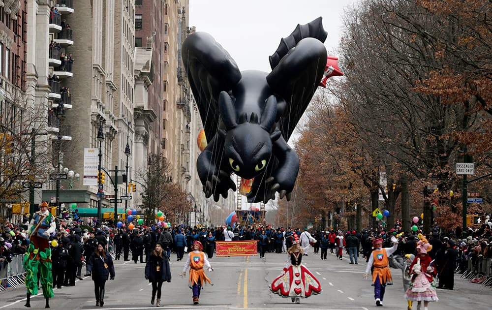 A balloon in the shape of a character in the children's cartoon movie 'How To Train Your Dragon' cruises along Central Park West during the Macy's Thanksgiving Day Parade, in New York.