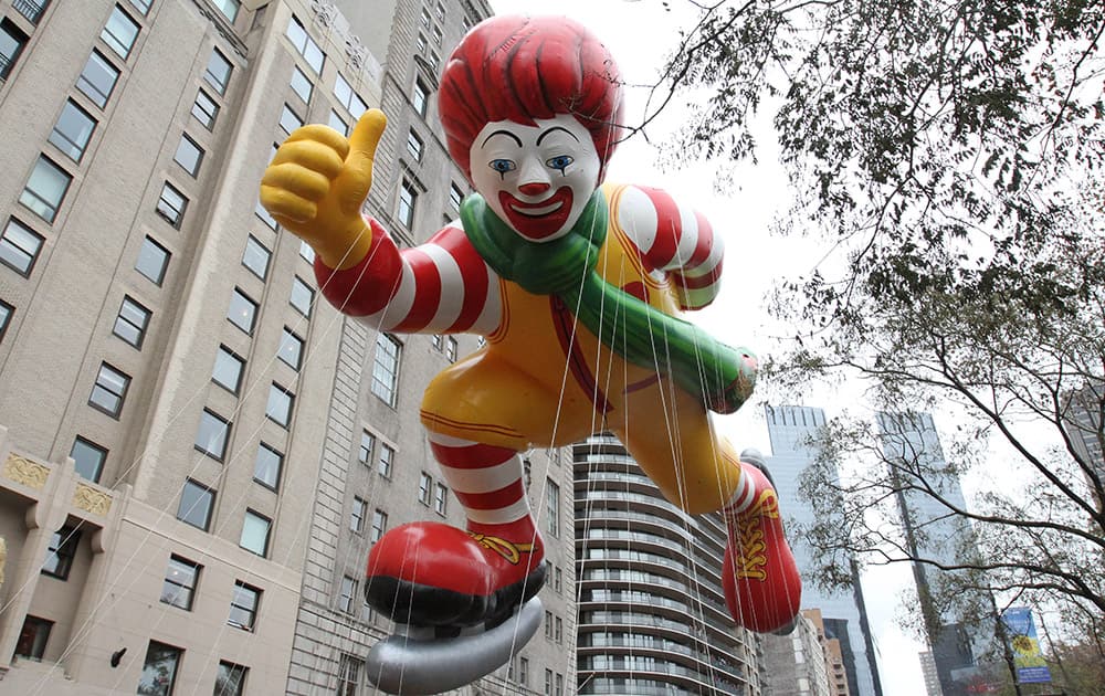 The Ronald McDonald balloon makes it way across New York's Central Park South during the Macy's Thanksgiving Day Parade, in New York.