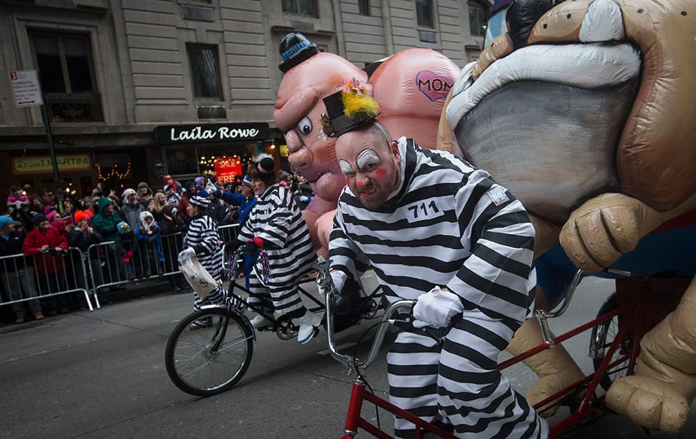 A performer rides down Sixth Avenue during the Macy's Thanksgiving Day Parade, in New York.