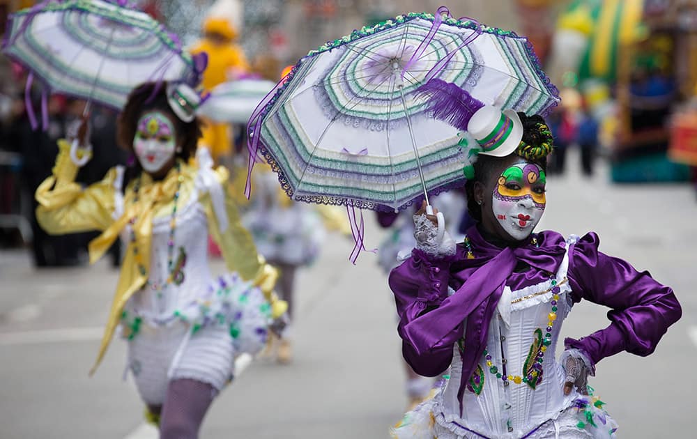 Performers march down Sixth Avenue during the Macy's Thanksgiving Day Parade, in New York.