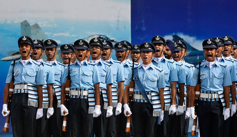 New graduates of the Indian Air Force (IAF) respond to a command during their passing out parade ceremony in Bangalore. A total of 121 officers including 45 women completed Friday after 74 weeks of training.