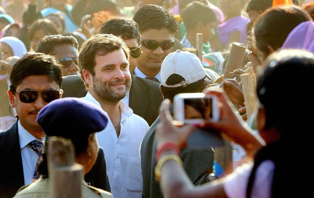 Congress Vice-President Rahul Gandhi interacts with supporters, at an election rally at Chaibasa in Jharkhand.