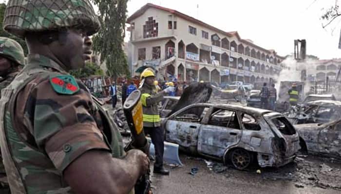 At least 100 feared killed in blasts during prayers at Nigeria mosque