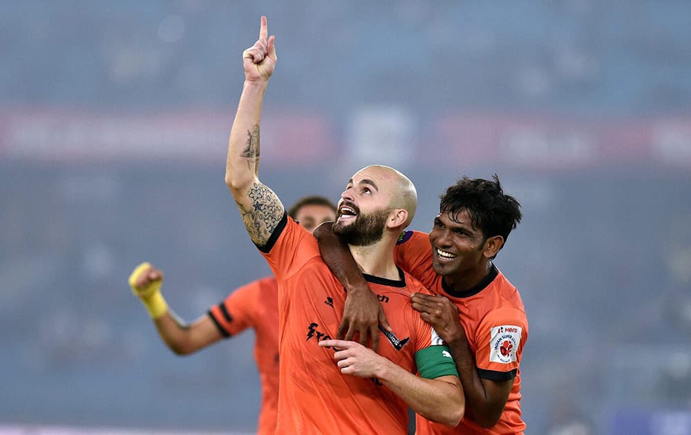 Delhi Dynamos FC captain Hans Mulder celebrates after scoring his sides first goal against Mumbai City FC during their ISL match at Nehru Stadium in New Delhi.