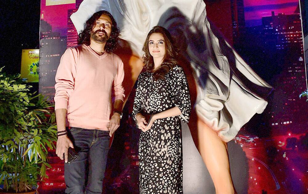 Kannada actors Kriti Karabanda and Arun Sagar poses, at a shopping mall in Bengaluru.