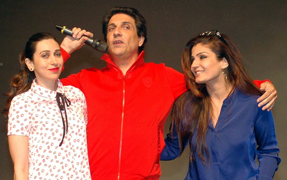 Bollywood actors Karishma Kapoor and Raveena Tandon with Choreographer Shiamak Daver during a dance show in Mumbai.