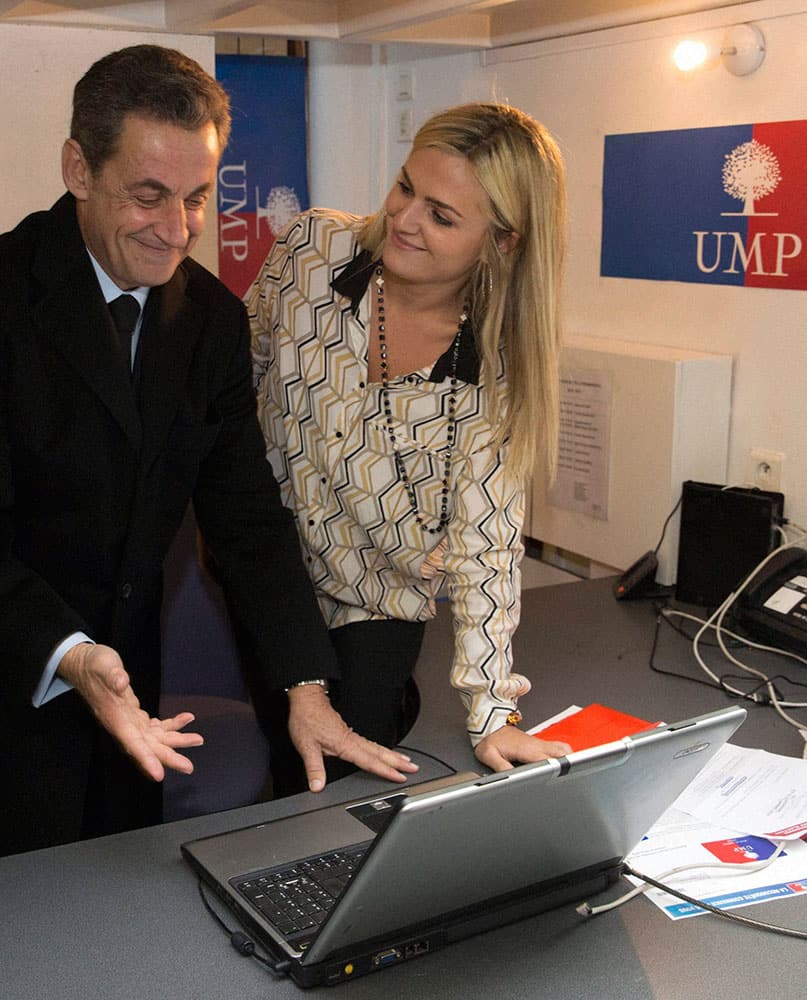 French former President Nicolas Sarkozy votes at a UMP party permanence for the leadership of France’s main opposition party, the UMP (Union for a Popular Movement), in Paris.
