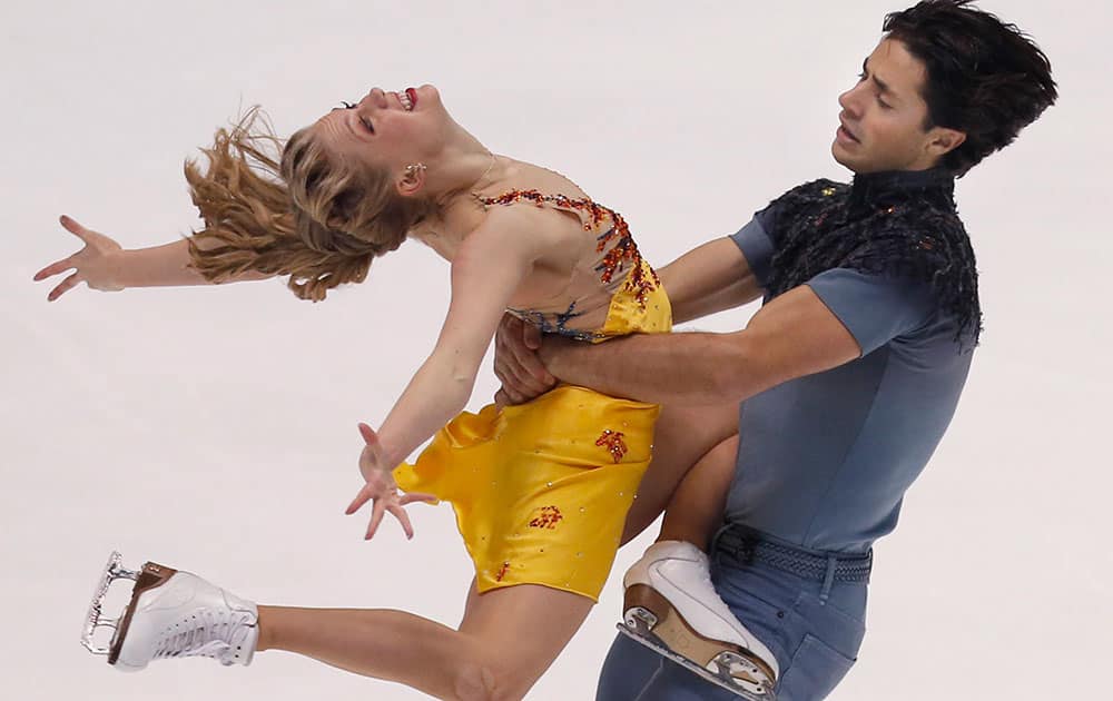 Kaitlyn Weaver and Andrew Poje of Canada perform during the Ice Dance's free dance at the NHK Trophy figure skating in Osaka, western Japan.