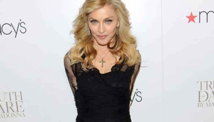 Madonna poses nude, talks about drugs and death