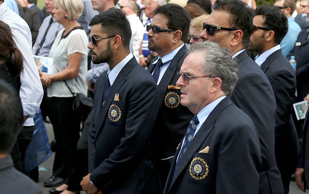 Virat Kohli attends the funeral of Australian cricketer Phil Hughes in Macksville, Australia.