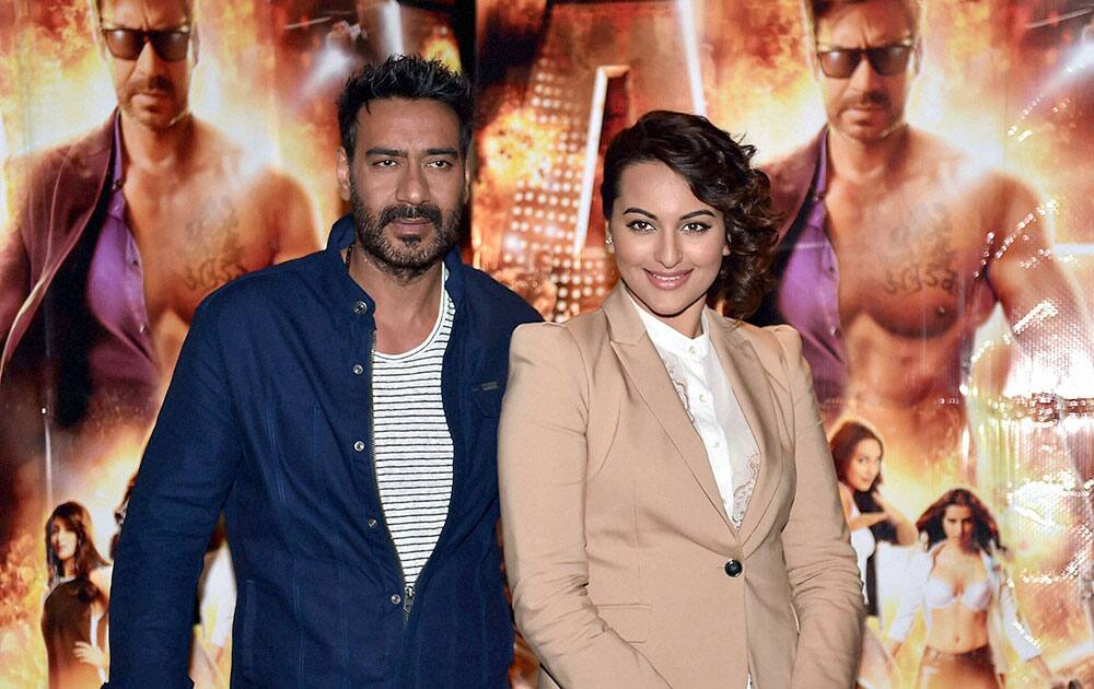 Bollywood actress Ajay Devgan with Sonakshi Sinha at a promotional event in New Delhi.