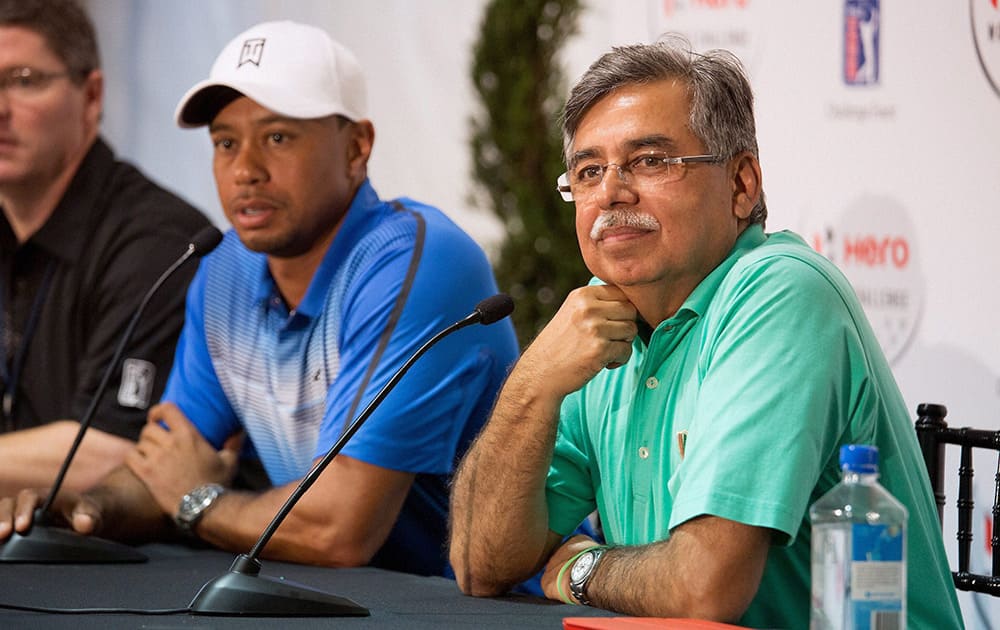 Pawan Munjal, VC & MD, HeroMotocorp with golfer Tiger Woods who was announced as the new brand ambassador of the company in Orlando.