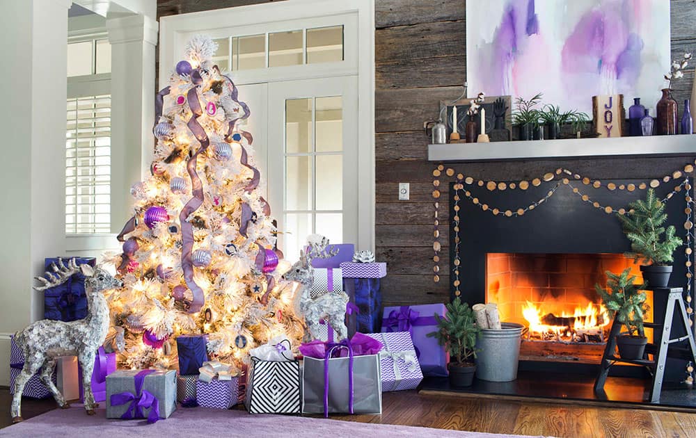 this photo provided by Brian Patrick Flynn and HGTV.com Holiday House, a living room showcases designer Flynn's love of flocked artificial trees. 