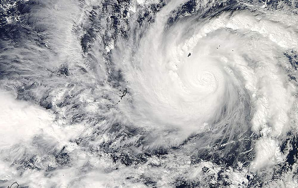 This image captured by NASA's Aqua satellite shows Typhoon Hagupit on Wednesday, Dec. 3, 2014 at 04:30 UTC in the western Pacific Ocean. The Philippines weather bureau is advising the public to brace for Typhoon Hagupit which continues to head towards the central Philippines and looking at the possibility it might hit the same areas as super Typhoon Haiyan which devastated Tacloban last year.