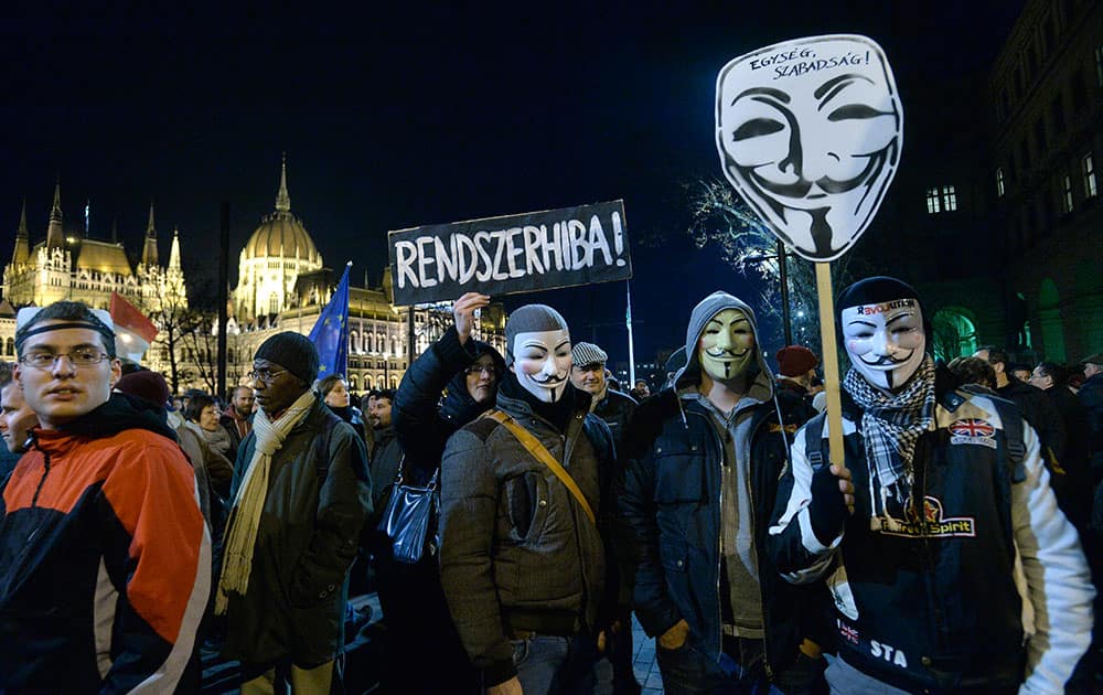 Demonstrators gather on the Kossuth Square in front of the Hungarian Parliament building during an anti-corruption demonstration called ‘Our country! Our money! in Budapest, Hungary.