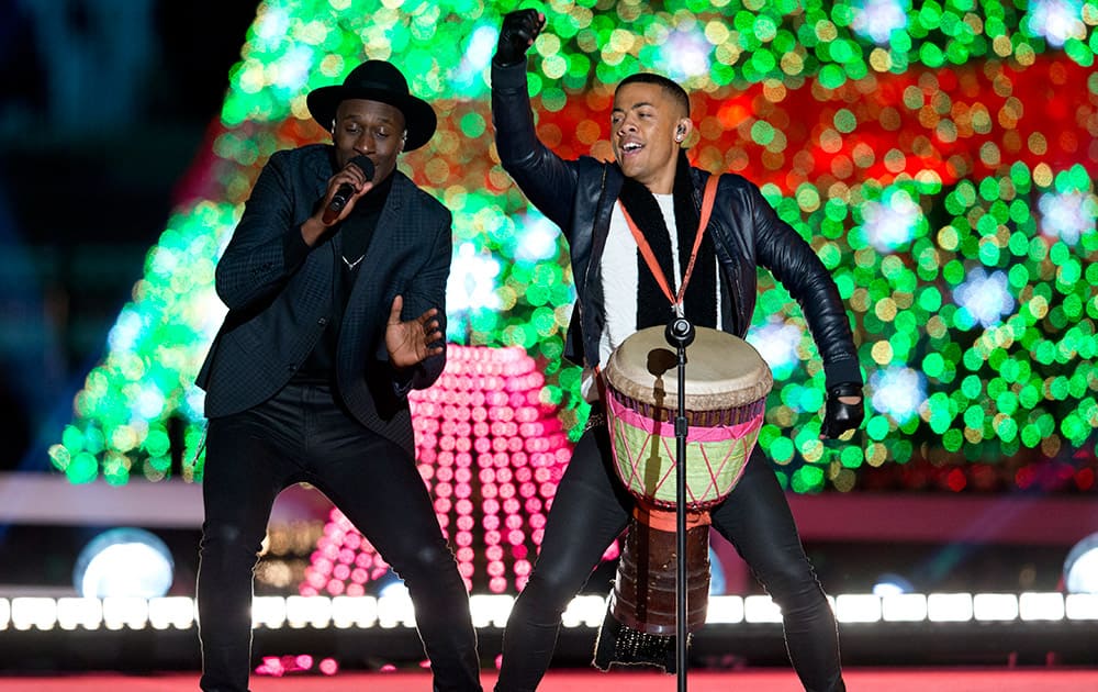 Nico & Vinz perform during the National Christmas Tree lighting ceremony at the Ellipse near the White House in Washington.