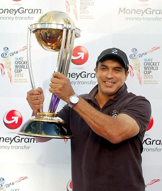 Former cricket player Robin Singh lifts ICC World Cup trophy, in Jalandhar.