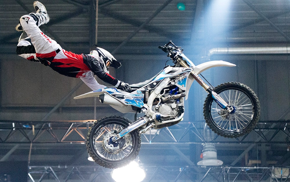 US driver Ronnie Faisst, performs during the jump contest FMX, of the 29. Geneva International Supercross competition in Geneva, Switzerland. 