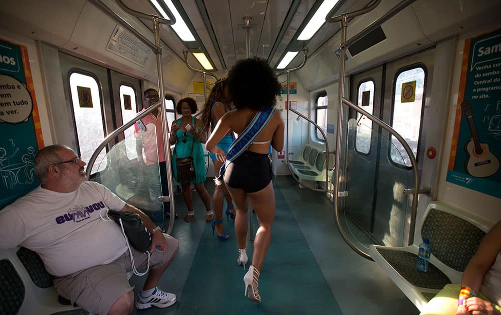 A woman dances samba in the Samba Train in Rio de Janeiro, Brazil.