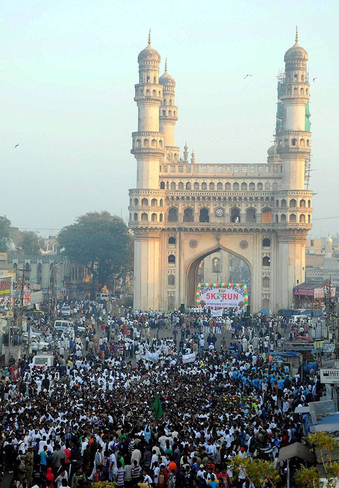 People take part in a 5 Km run from Charminar to Barkas play ground with the aim to spread the message that the city police is a “Citizen Friendly Police” in Hyderabad.