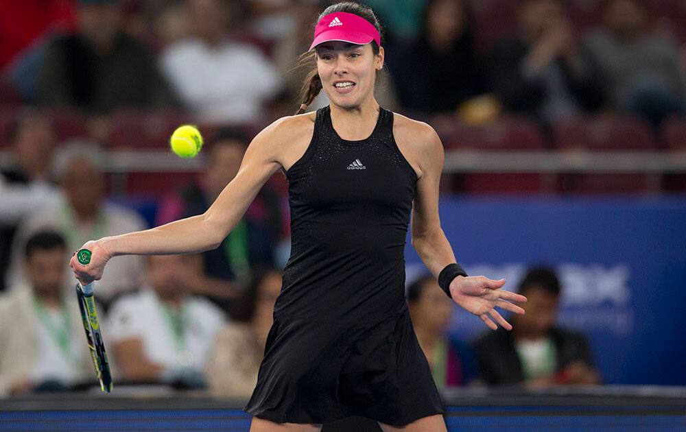 Micromax Indian Aces player Ana Ivanovic plays against DBS Singapore Slammers' Daniela Hantuchova, during the International Premier Tennis League, in New Delhi.