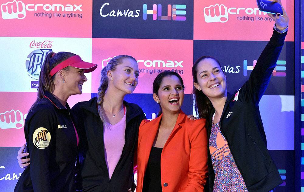 Tennis Champions Daniela Hantuchová, Ana Ivanovic, Sania Mirza and Kristina Mladenovic take selfies with the newly launched Micromax Canvas Hue in New Delhi.