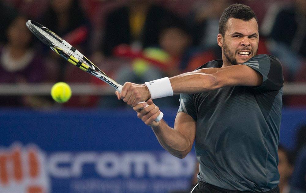 Manila Mavericks player Jo-Wilfried Tsonga plays against DBS Singapore Slammers's Tomas Berdych, during the International Premier Tennis League, in New Delhi, India.