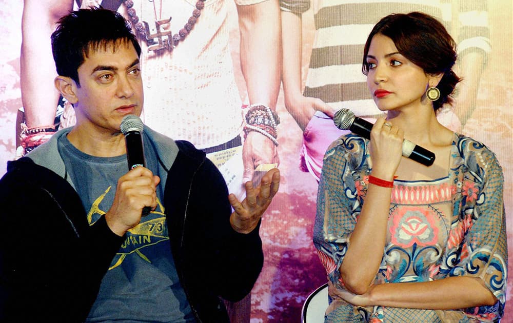 Aamir Khan and actress Anushka Sharma talking to the media during the promotion of their upcoming film PK at PVR Banjara Hills in Hyderabad.