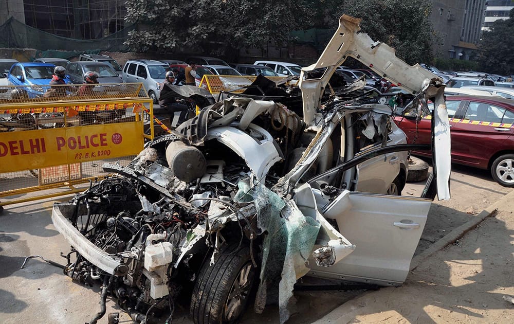 The mangled remains of an Audi car which collided with a dumper at Barakhamba Road on Monday night, at a police station in New Delhi.