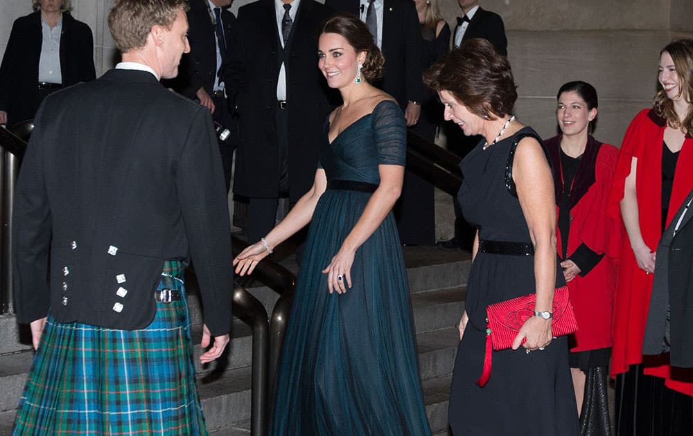 Kate, Duchess of Cambridge, arrives at the Metropolitan Museum of Art, in New York. Britain's Prince William and the Duchess of Cambridge are on the last of their 3-day tour of New York City, their first visit to the United States since a trip to California in 2011.