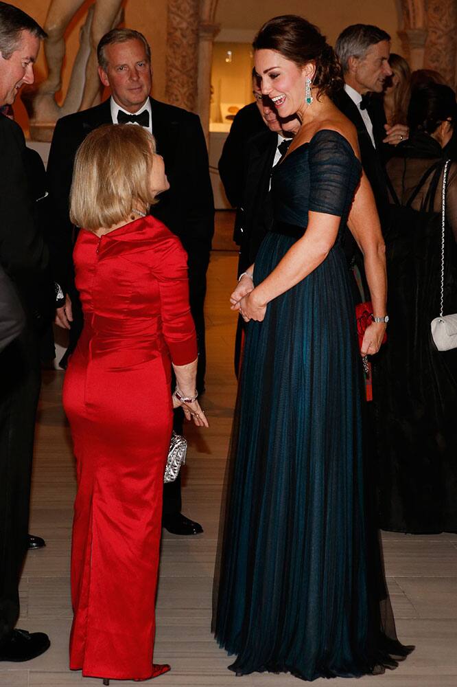 Kate, Duchess of Cambridge, right, attends the St. Andrews 600th Anniversary Dinner at the Metropolitan Museum of Art, in New York..