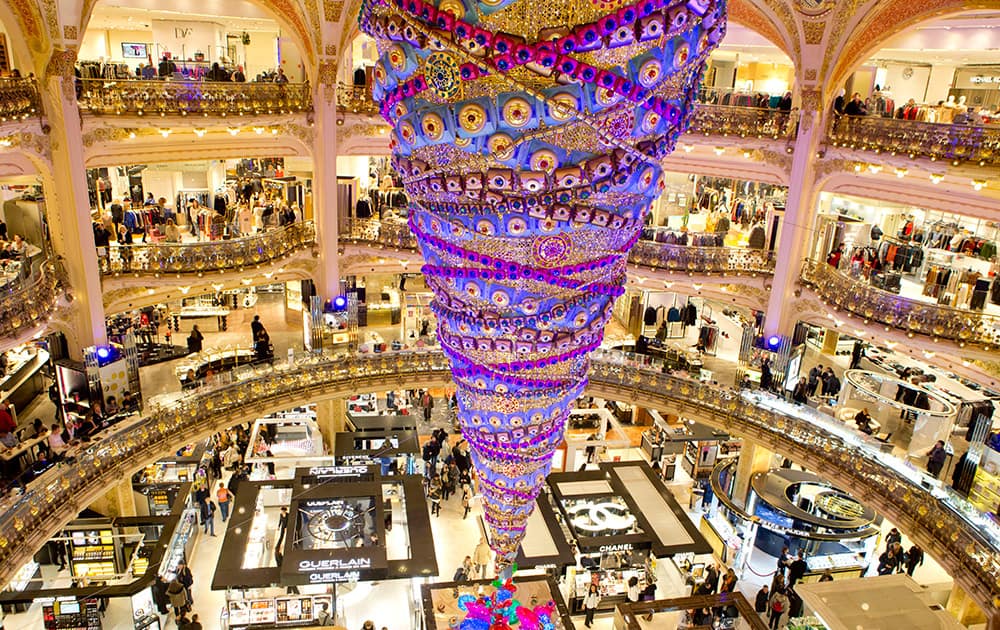 An inverted Christmas tree stands at the center of the department store Galeries Lafayette in Paris, France.