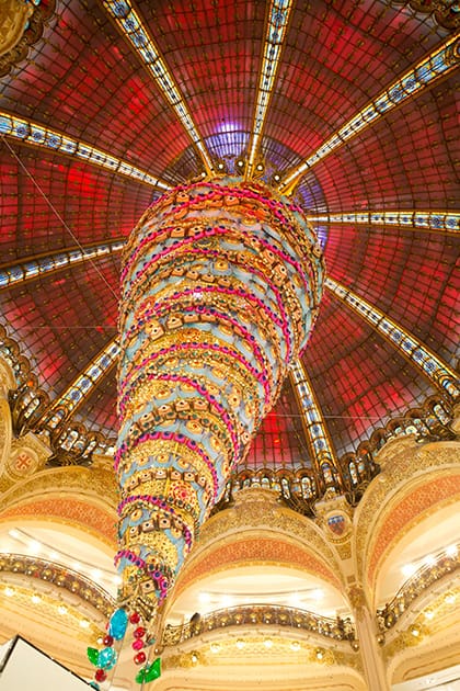 An inverted Christmas tree stands at the center of the department store Galeries Lafayette in Paris, France.