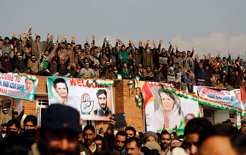 Kashmiris gather for an election rally addressed by Congress party leader Sonia Gandhi at Shangas, some 78 kilometers south of Srinagar, Kashmir.