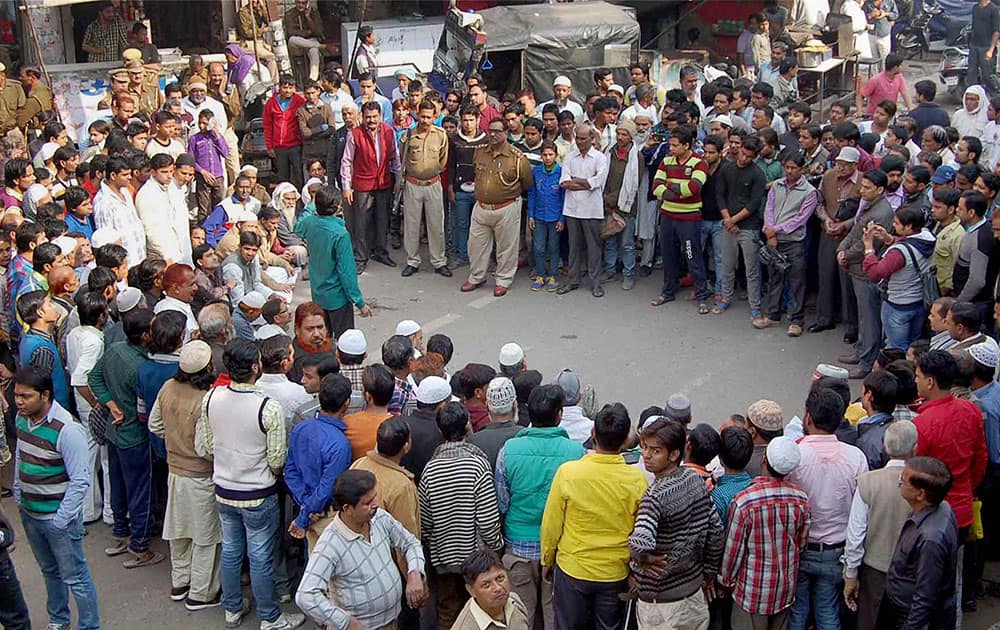 Muslims holding a protest against alleged conversion of some of families of the community, in Agra.