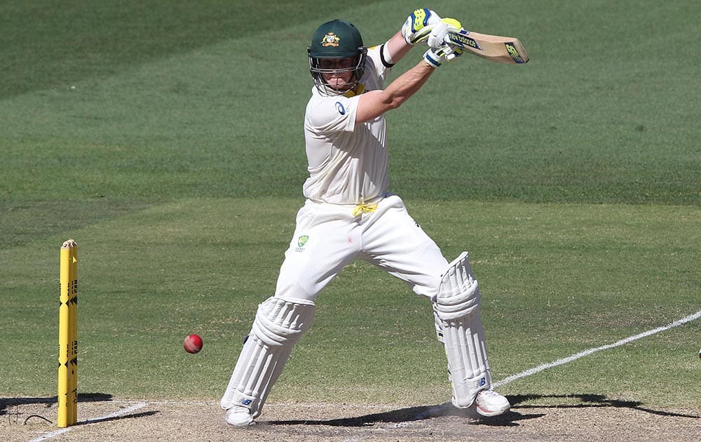 Australia's Steven Smith plays a shot, during the fourth day of their cricket test match in Adelaide, Australia.