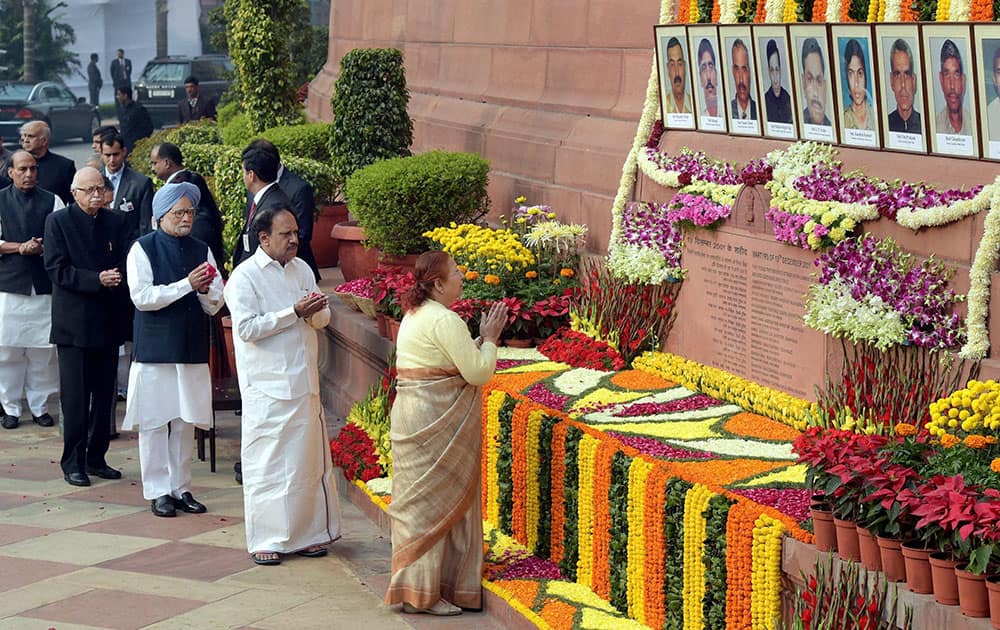 Lok Sabha Speaker Sumitra Mahajan and other dignitaries paying tributes to the martyrs of 2001 Parliament attack on its 13th anniversary, at Parliament House in New Delhi.