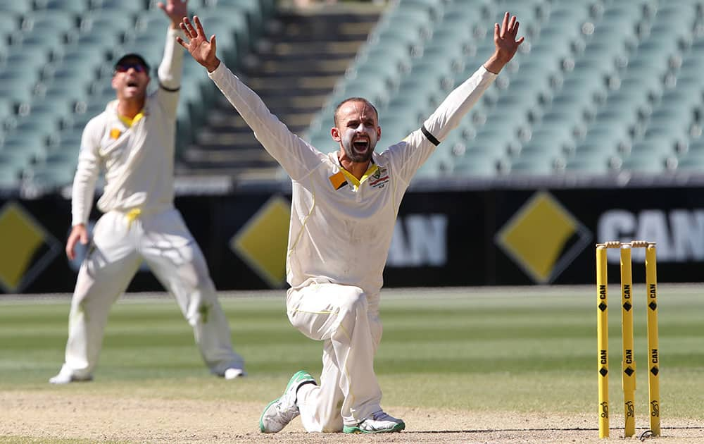 Australia's Man of the Match Nathan Lyon appeals for a wicket during the final day of their cricket test match against India in Adelaide, Australia.