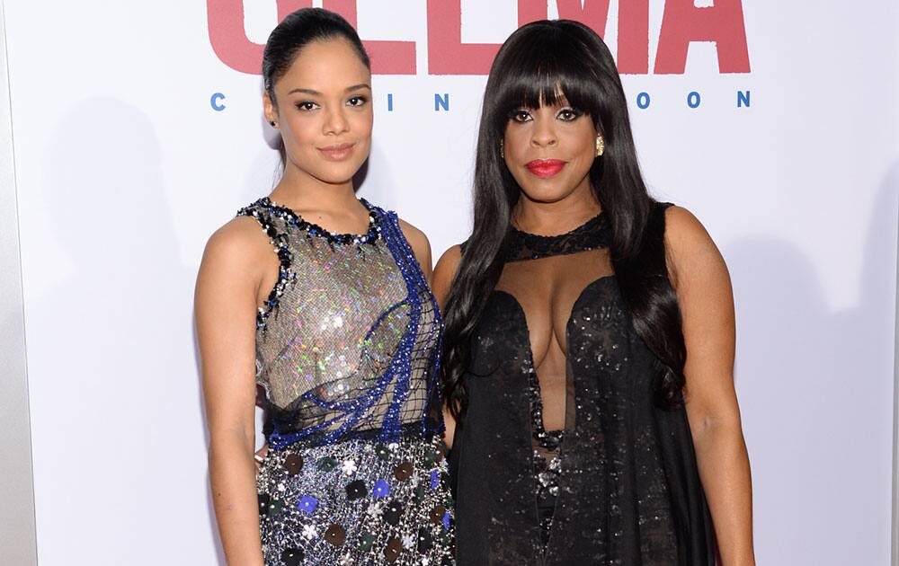 Actresses Tessa Thompson, left, and Niecy Nash attend the premiere of