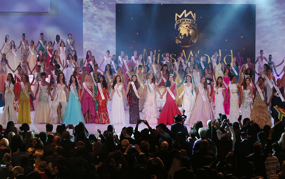 Miss South Africa, Rolene Strauss, centre, is crowned Miss World 2014 at the final, on stage at the Excel centre in east London