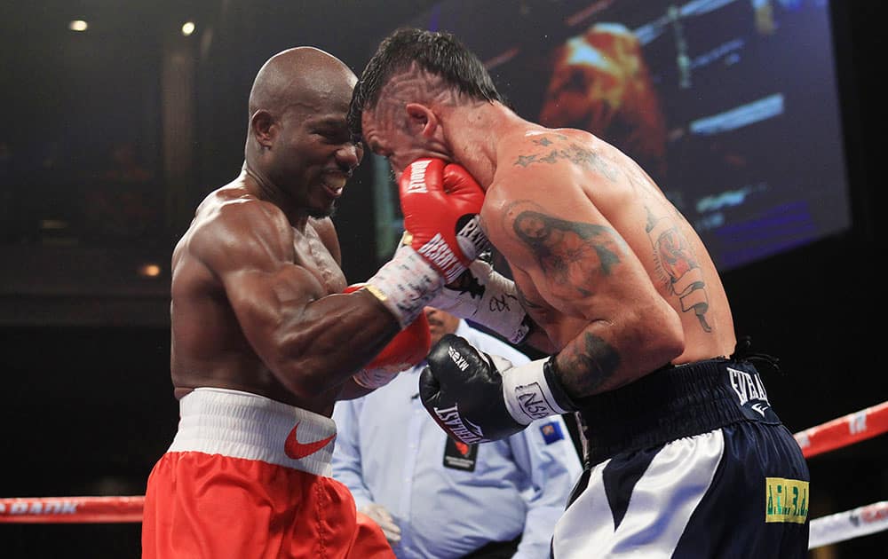 Timothy Bradley hits Diego Chaves with a right uppercut during their welterweight fight at the Cosmopolitan in Las Vegas. After 12 rounds, the fight ended in a draw.