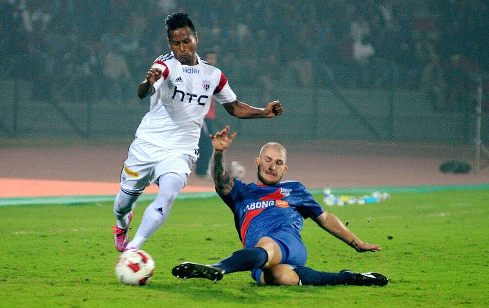 Players of North East United FC and Mumbai City FC in action during their ISL match at Indira Gandhi Stadium.