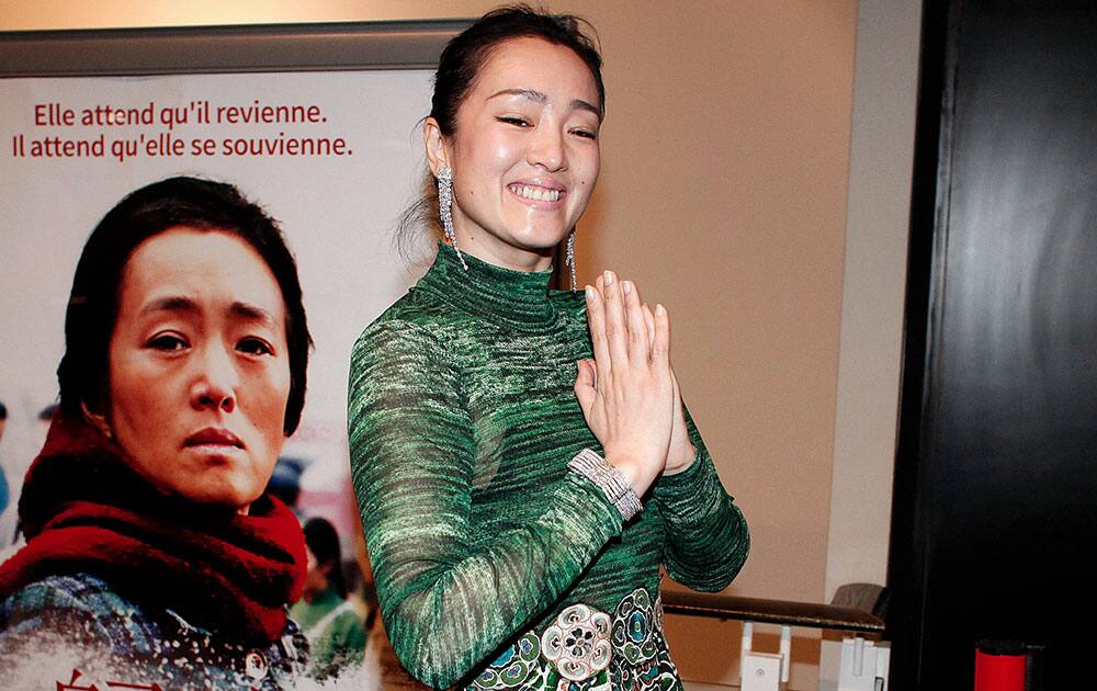 Chinese actress Gong Li poses for photographers prior to the presentation of the movie
