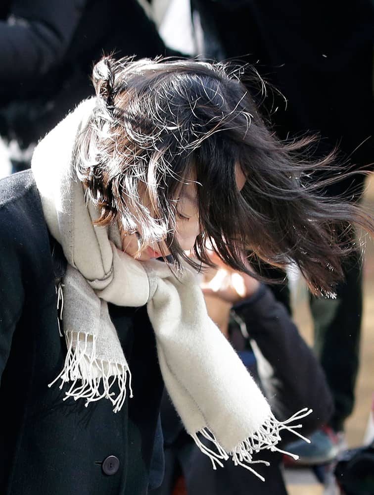 Cho Hyun-ah, who was head of cabin service at Korean Air Lines Co. and the oldest child of Korean Air chairman Cho Yang-ho, bows upon her arrival for questioning at the Seoul Western Prosecutors Office in Seoul, South Korea.